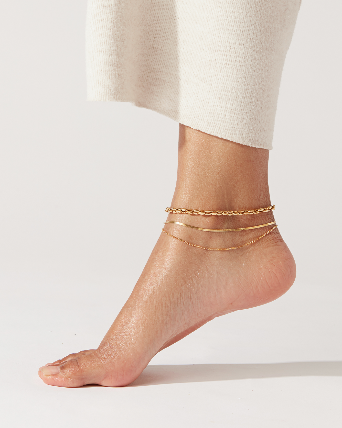 JENNY BIRD Gold Dhani and Surfside Waterproof Anklet Stack