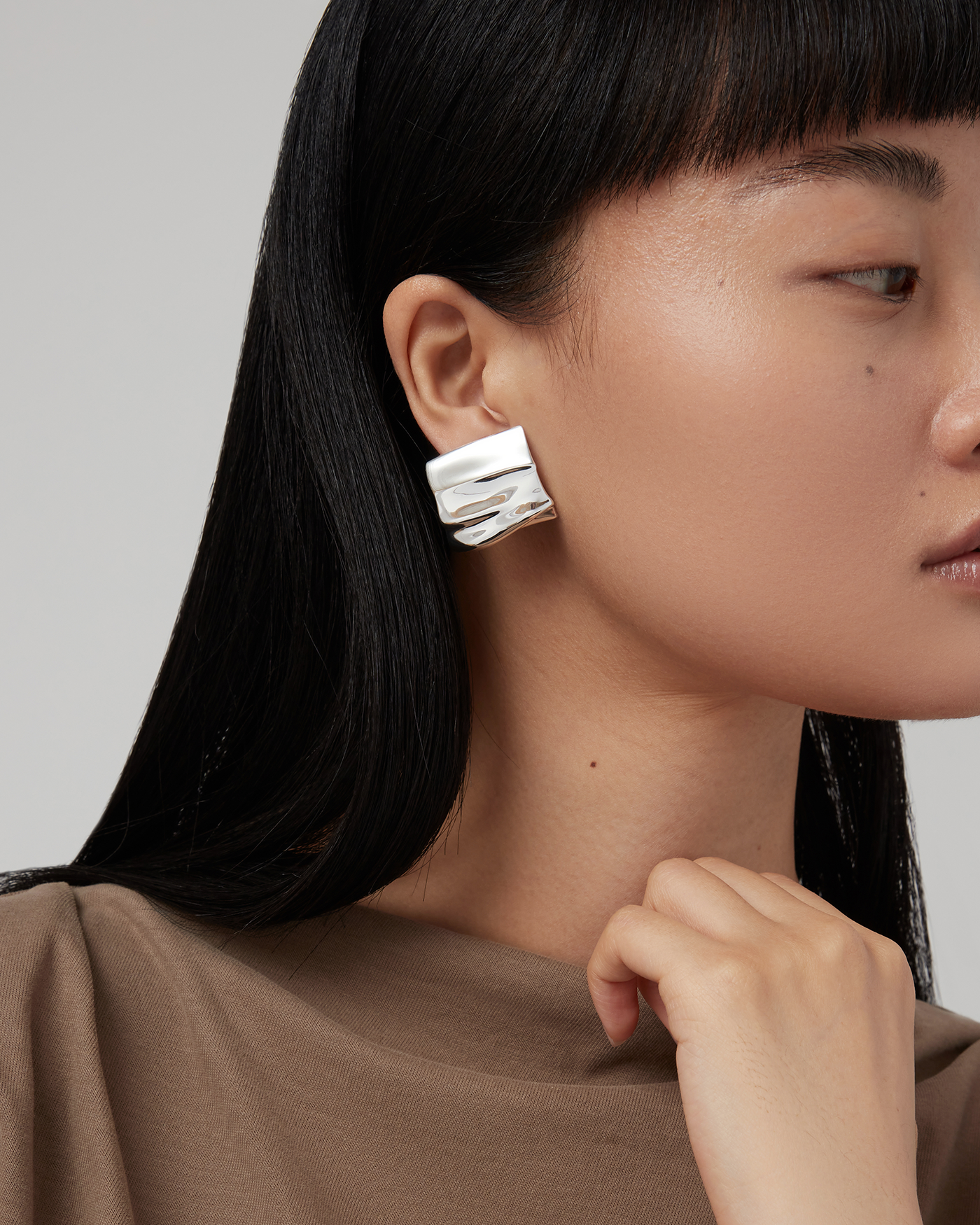Sundra Clip On Earrings