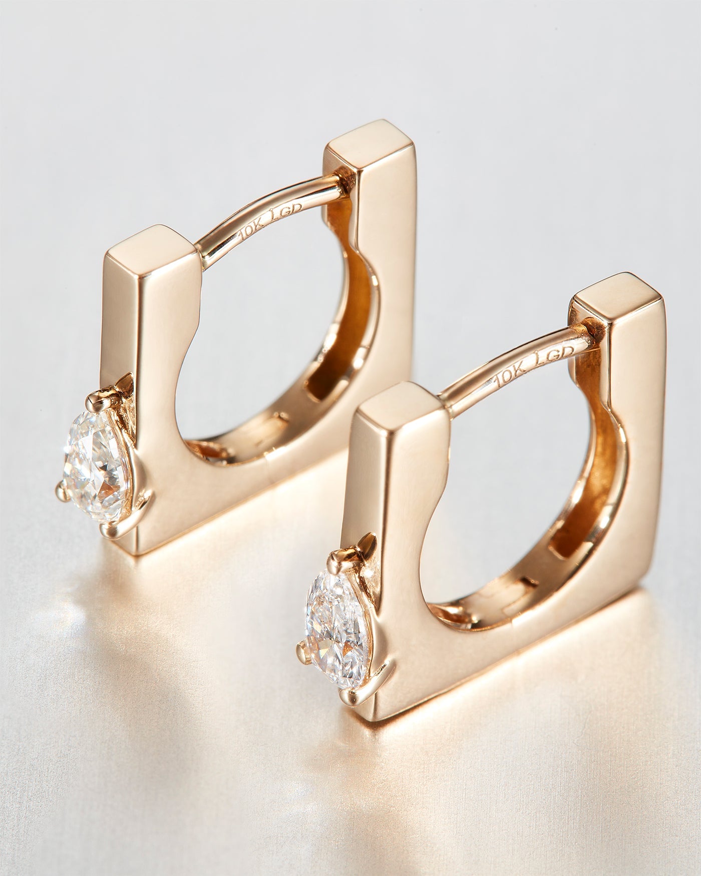 10K Pear Cut Diamond Huggie Earrings