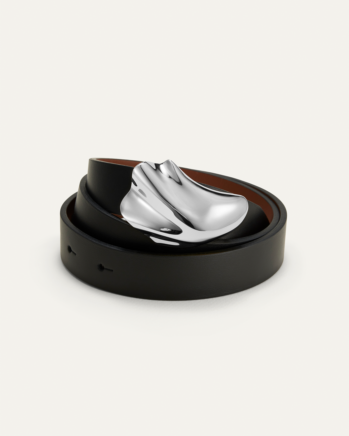 The JENNY BIRD custom silver belt buckle on a 100% leather strap